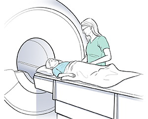 Technician preparing boy for CT scan.